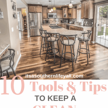 A modern, spacious kitchen with a large island, bar stools, wooden floors, and stainless steel appliances. Text reads: 10 Tools & Tips to Keep a Clean House and itsasouthernlifeyall.com.