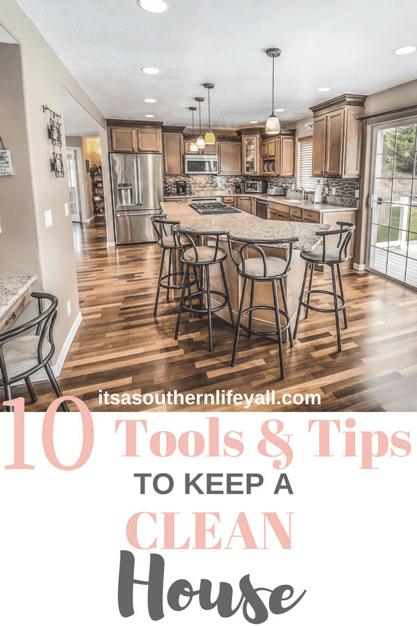 Spotless kitchen with island and wood floors with text overlay - Stop Using Alt Tags for Pinterest Pin Descriptions