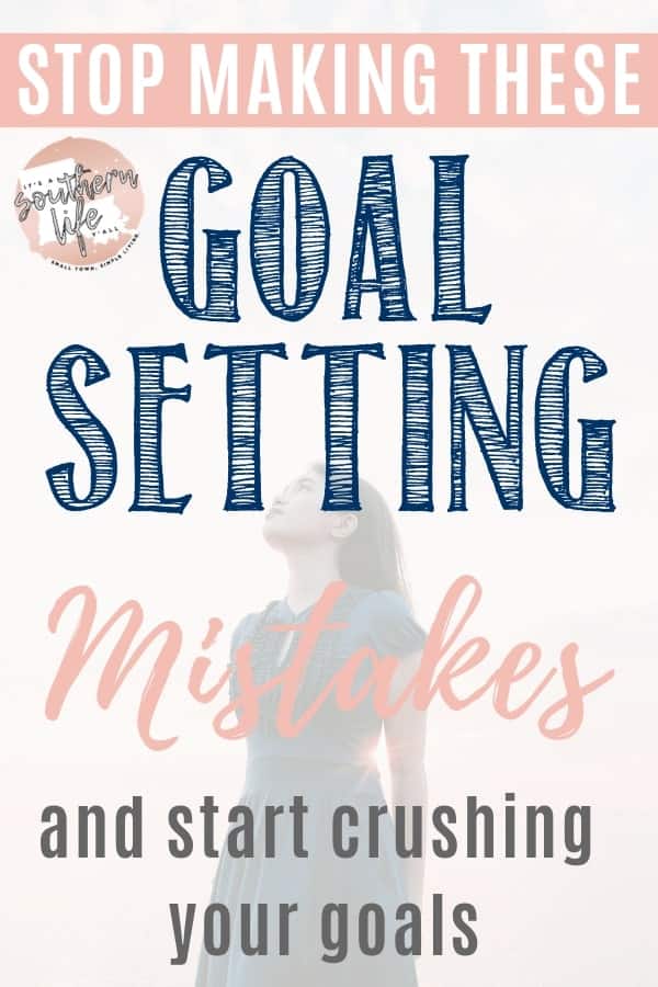 Woman looking at cloud filled sky with Stop making these goal setting mistakes and start crushing your goals text overlay. 