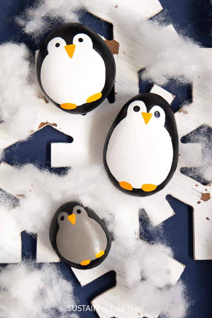 Painted penguin rocks kid's craft.