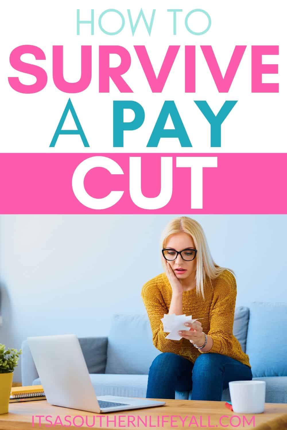 Woman sitting on her sofa looking at a handful of bills with a concerned look on her face. Image has text overlay of How to survive a pay cut. 