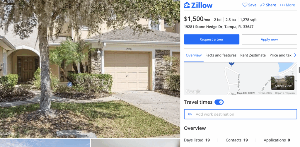 A person places a rolled-up U.S. dollar bill into a white ceramic piggy bank shaped like a dog, against a pale pink background.