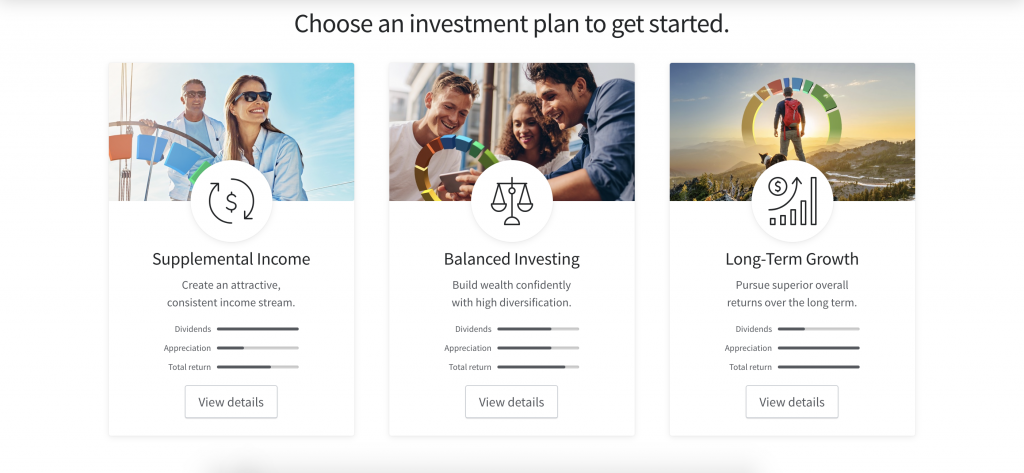 A black notebook labeled NOTES with sunglasses on top, a gold pen, a bottle of ink with a feather, and a pair of wireless earbuds arranged on a white surface.