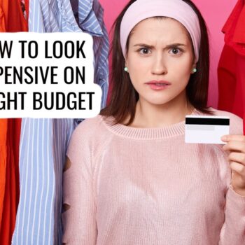 A young woman stands between colorful clothes, holding a credit card and looking concerned. Text on the image reads: “How to look expensive on a tight budget.”.
