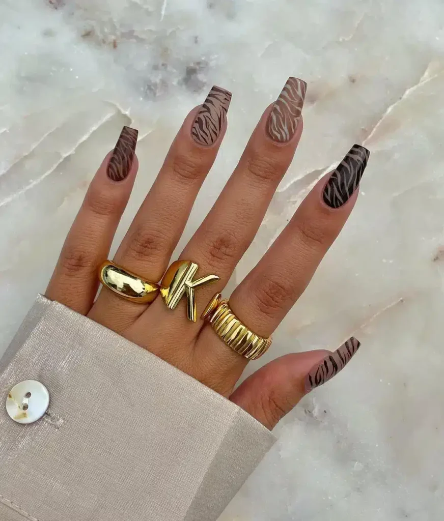nude zebra print autumn nails