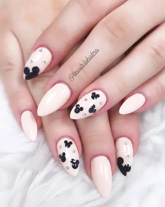 white diamantee disney nails.