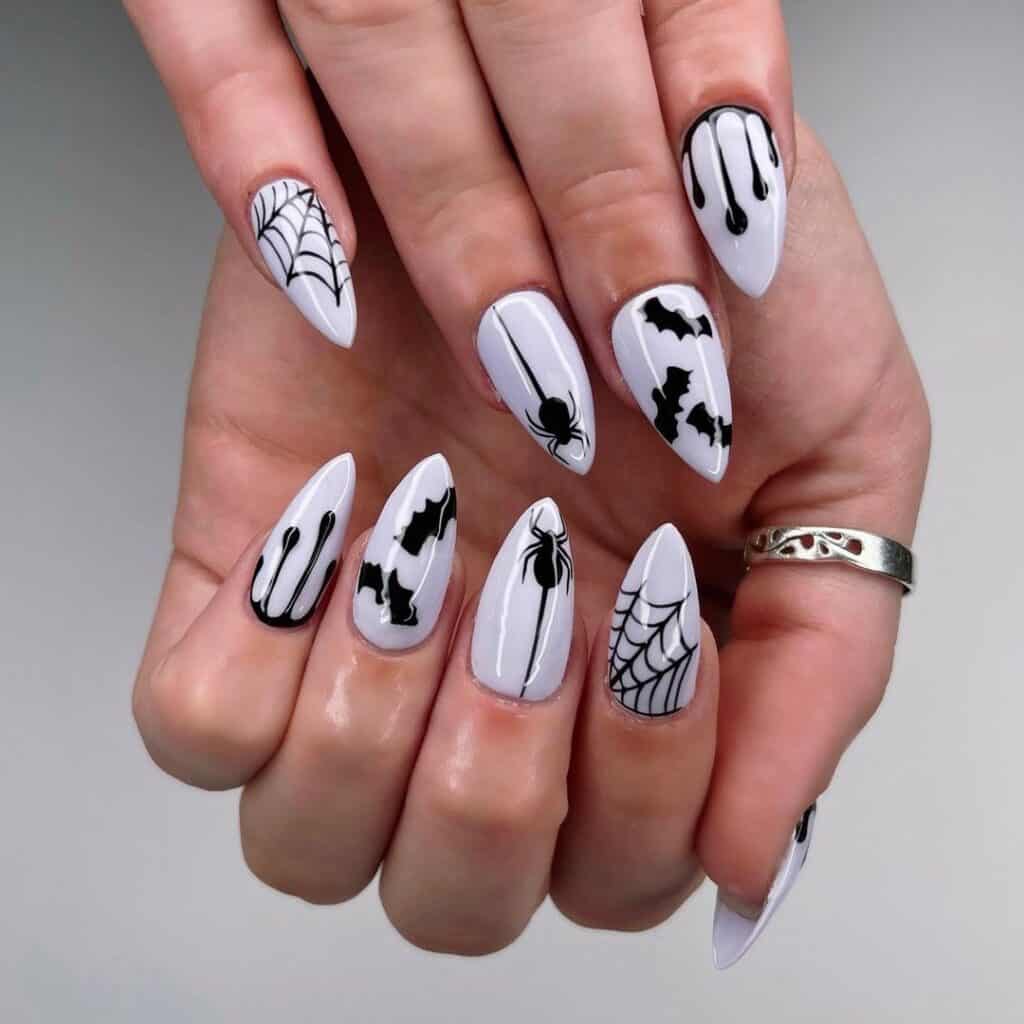 mauve and black halloween dip nail ideas