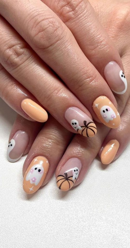 peach ghost halloween dip nail ideas