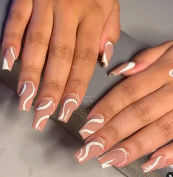 dusty rose swirl nails