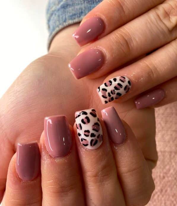 dusty rose nails with animal print accent nail
