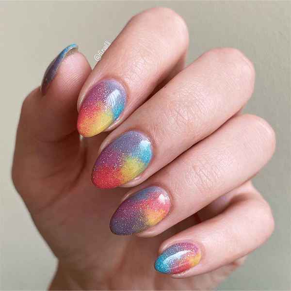 70s inspired nails tie dye glitter
