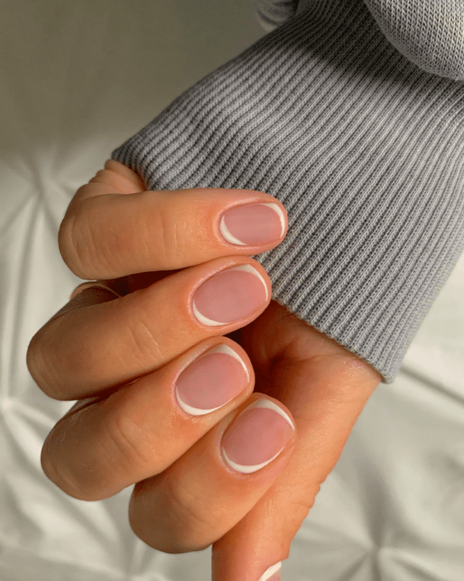 nude and white swirl classy engagement nails