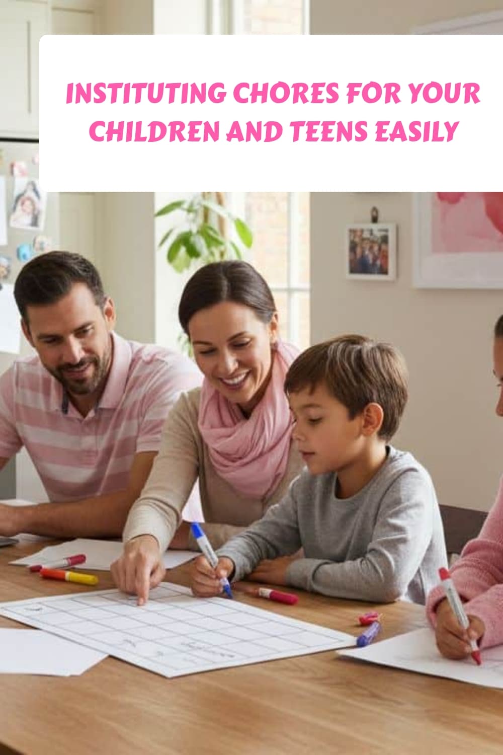 A family sits at a table together, smiling and writing on a large chore chart with colorful markers. The text above reads, Instituting chores for your children and teens easily.