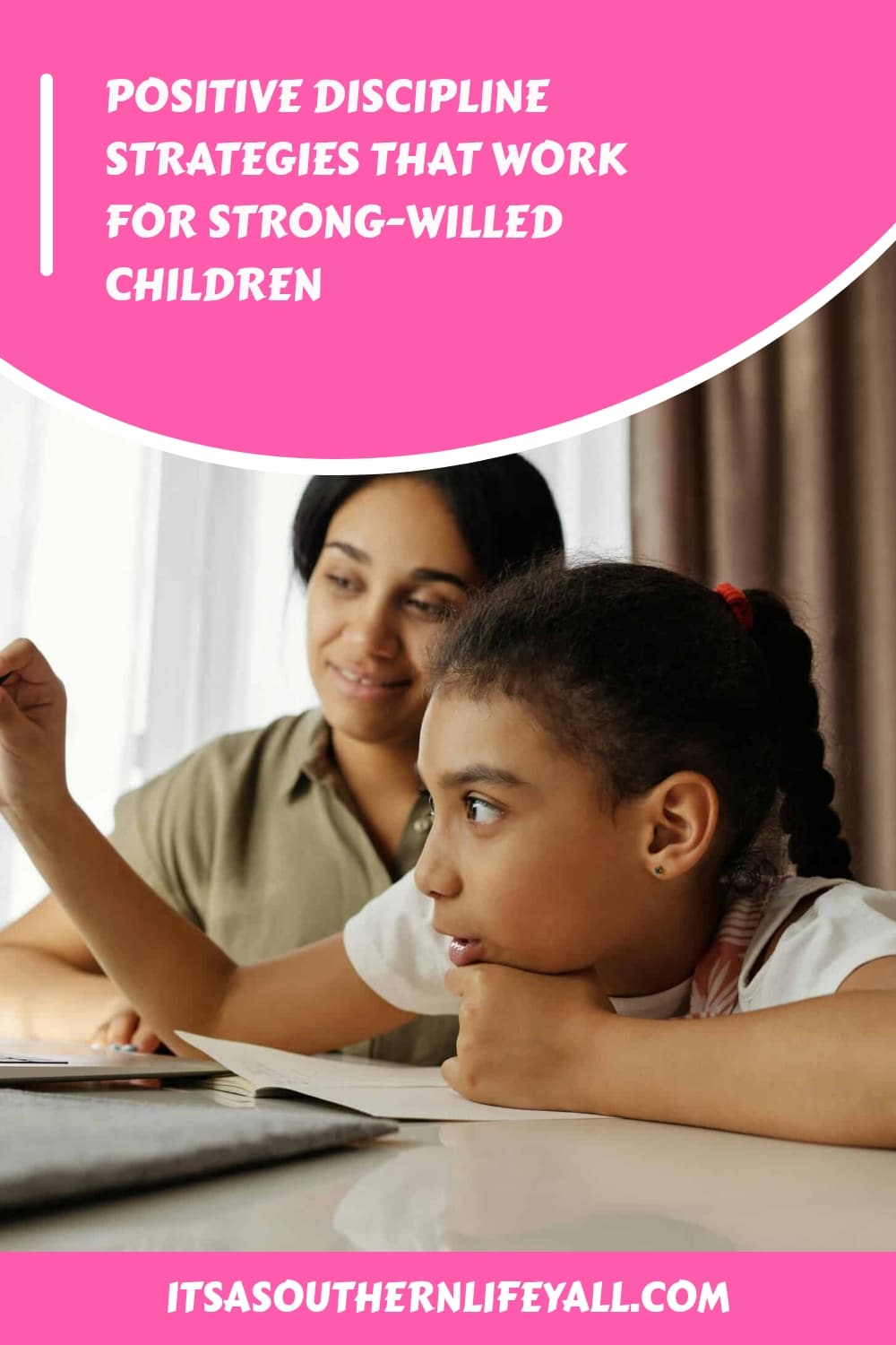A woman and a young girl sit together at a table, looking at a laptop. The image features a pink banner with the text: Positive discipline strategies that work for strong-willed children.