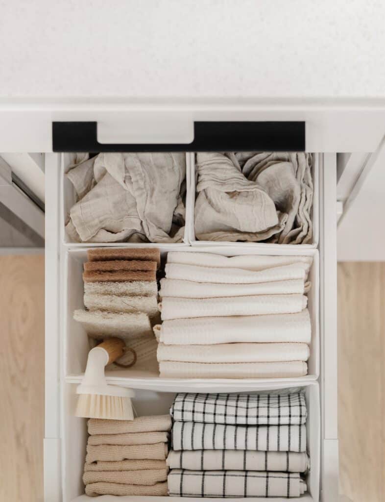An overhead view of neatly folded clothes in a drawer