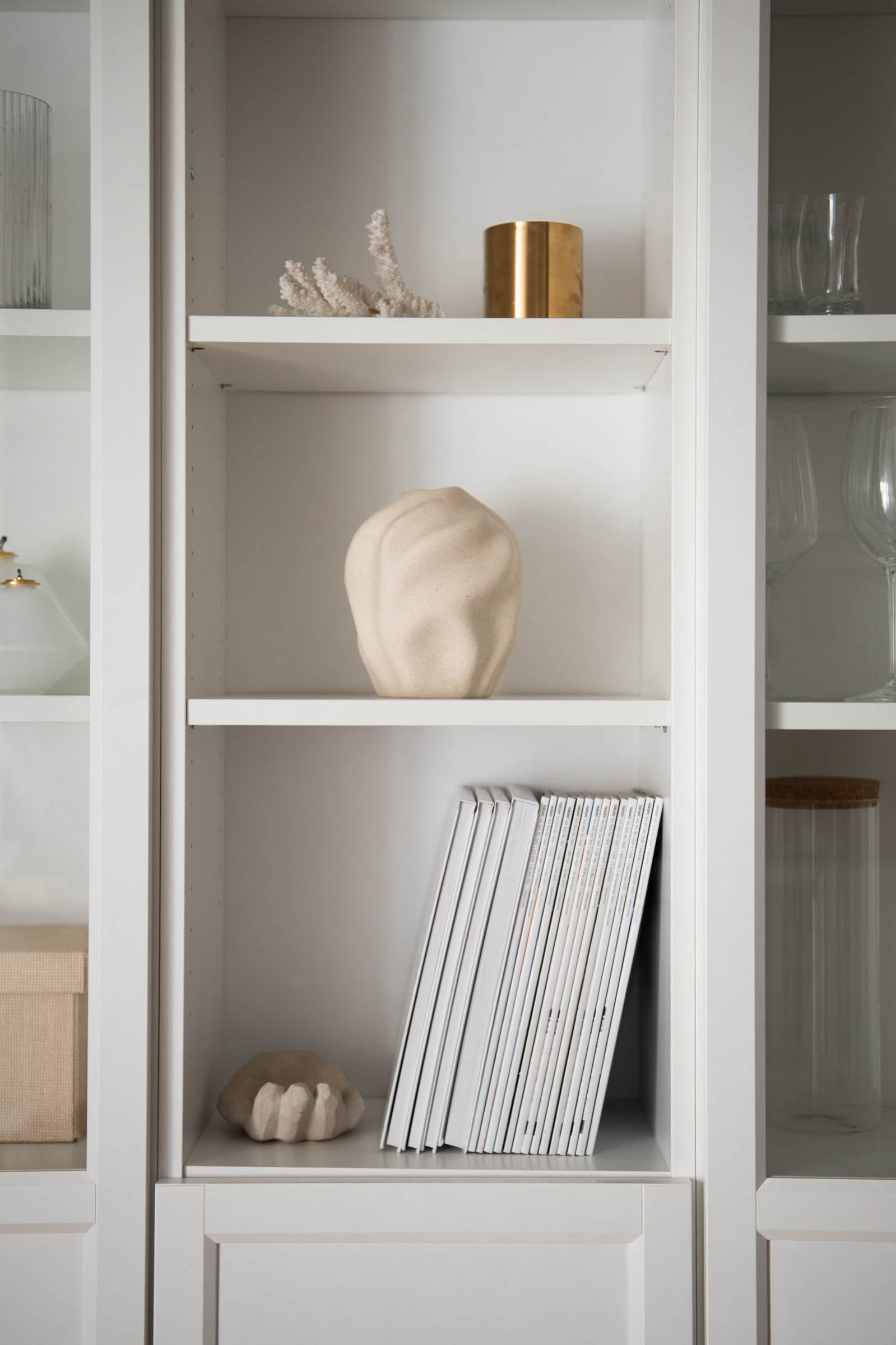 A shelf with neatly filed books