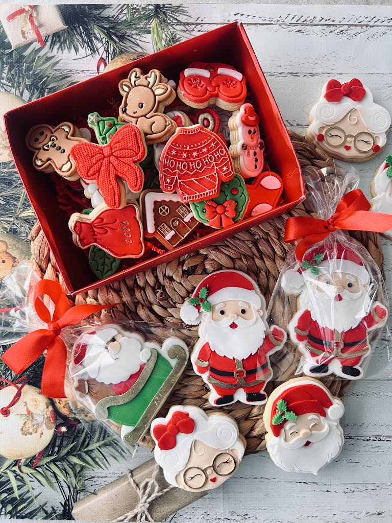 Decorative Christmas cookies featuring Santa, reindeer, and holiday themes.