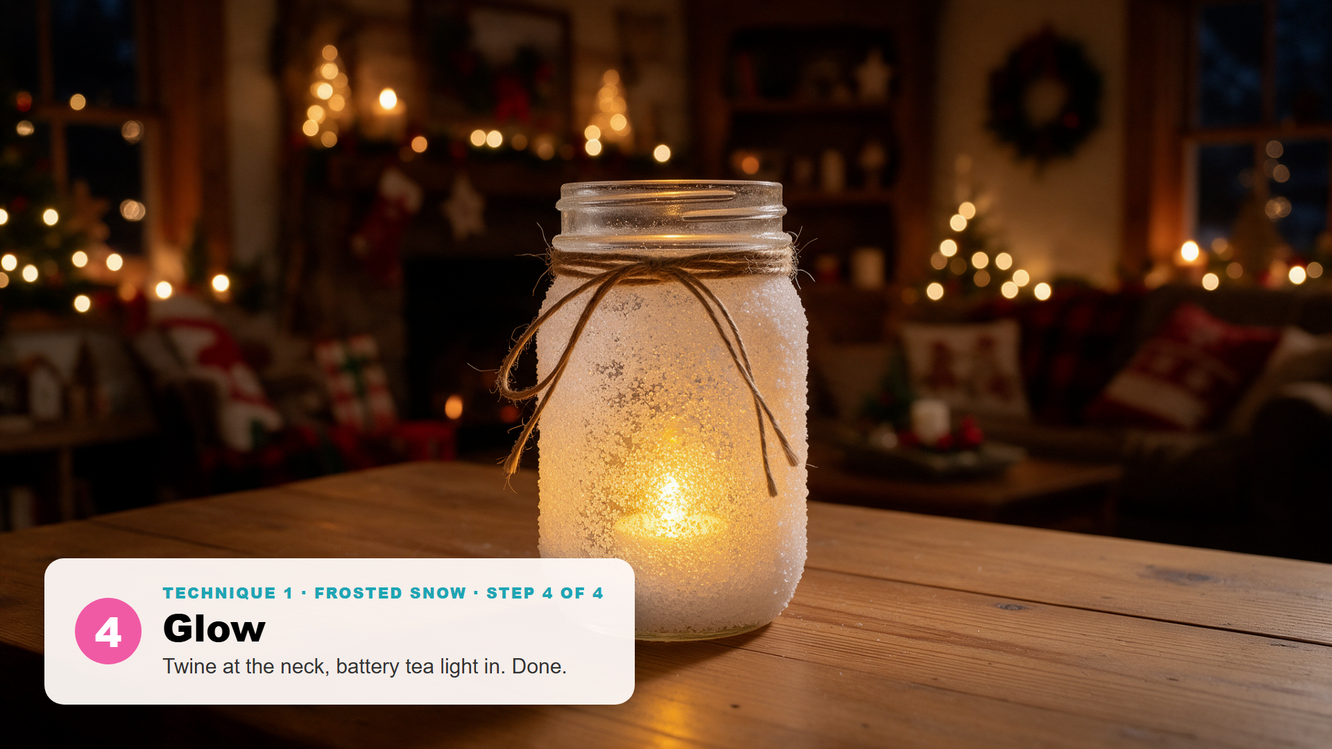 Frosted mason jar Christmas luminary coated in Epsom salt snow with a jute twine bow, glowing from a battery tea light