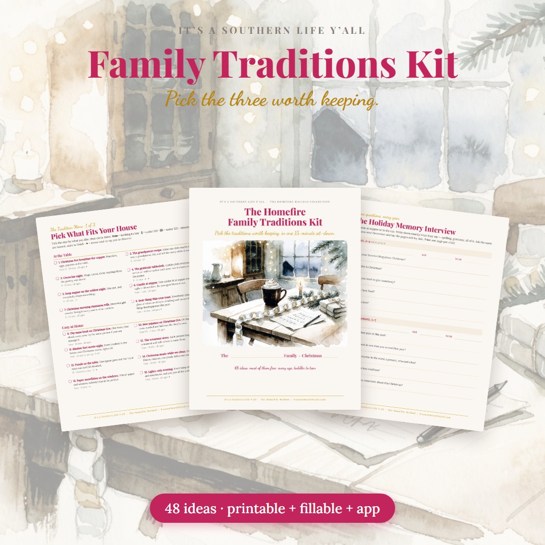 The Homefire Family Traditions Kit: the cover, a page of the tradition menu and the Memory Interview, fanned on a watercolor kitchen table